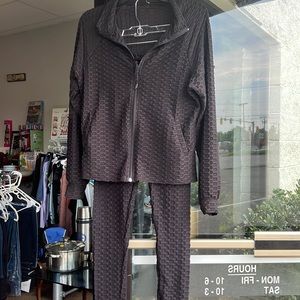 Black Athletes wear jacket and pants